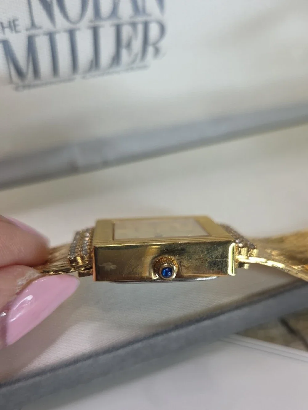 Nolan Miller Gold Chain Bracelet Watch  Rhinestone Accents Blue Sapphire Crown